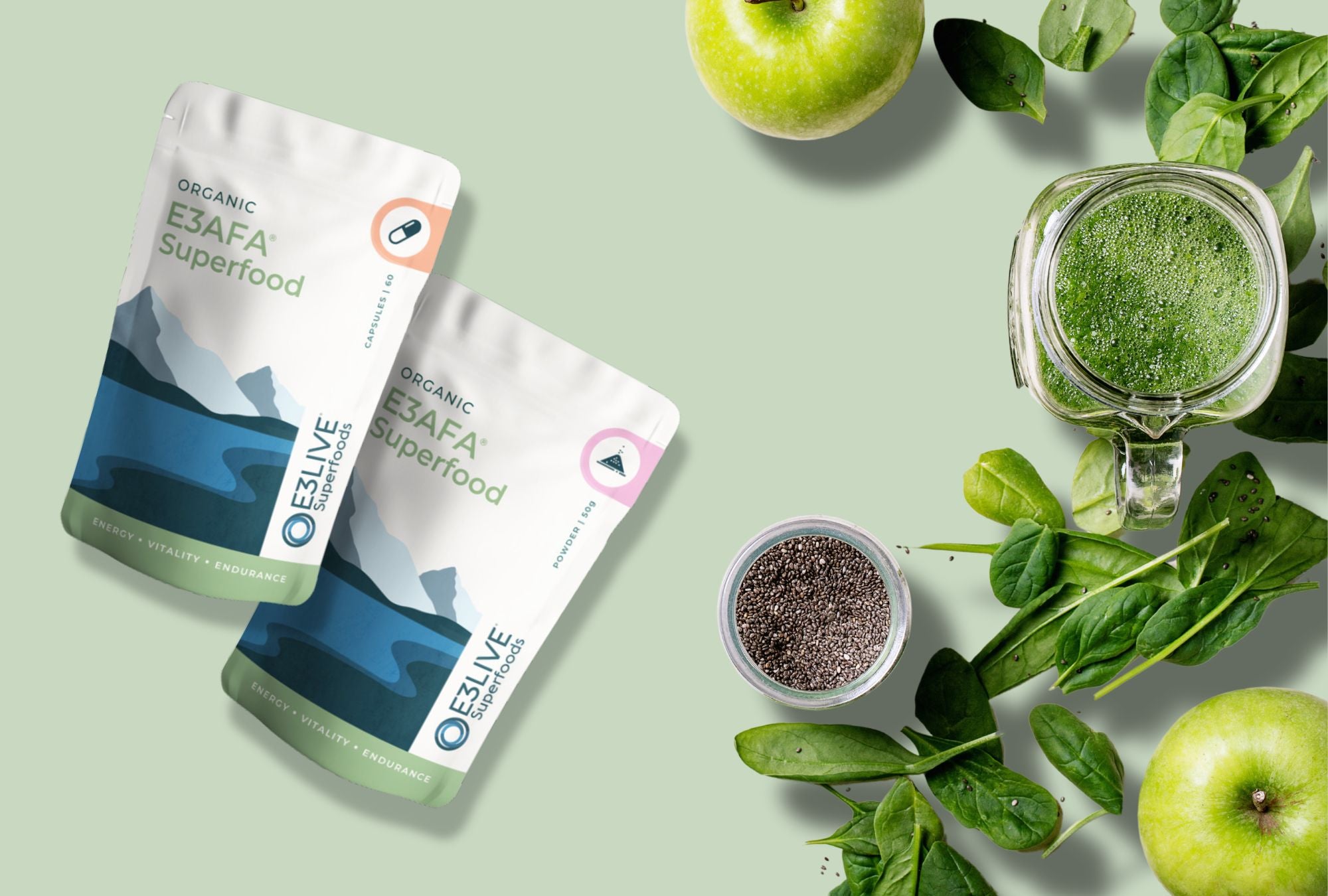 Organic E3AFA Superfood capsules and powder packaging alongside fresh spinach, chia seeds, green apple, and a green smoothie, representing E3AFA and E3Live products for energy, vitality, and endurance.