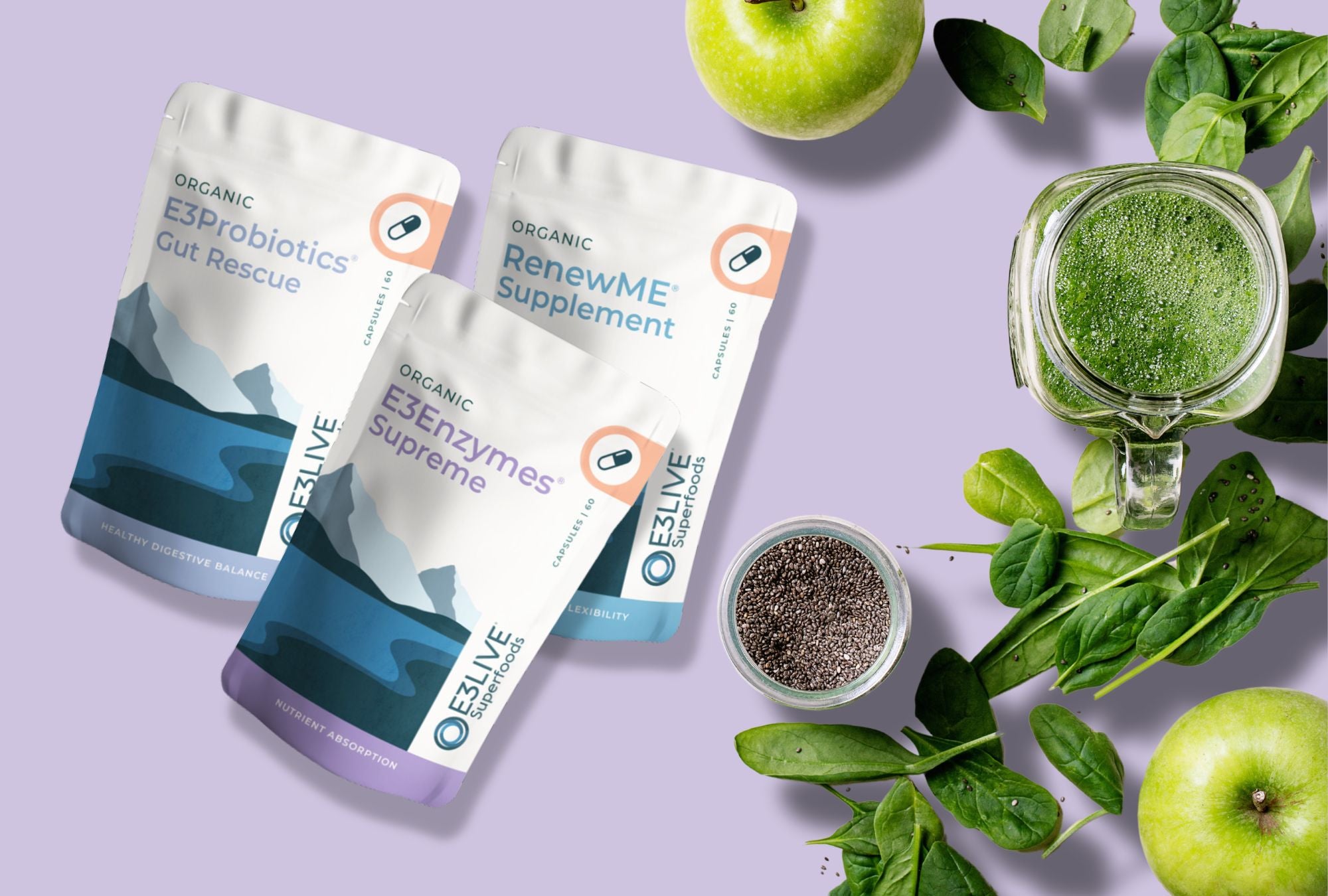 Organic E3Probiotics Gut Rescue, E3Enzymes Supreme, and RenewME Supplement packaging alongside fresh spinach, chia seeds, green apple, and a green smoothie, representing specialty products for digestive health, nutrient absorption, and flexibility.